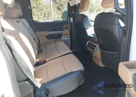 2023 Ford F-150 Lariat from USA, damaged, VIN 1FTFW1ED7PFD04587